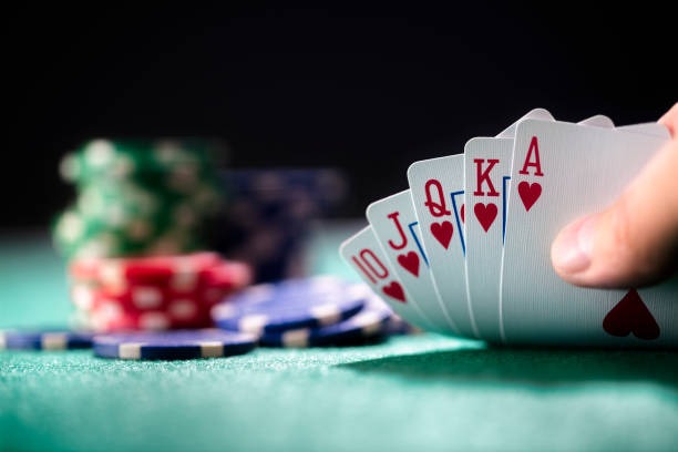 Close up of live blackjack game with dealer